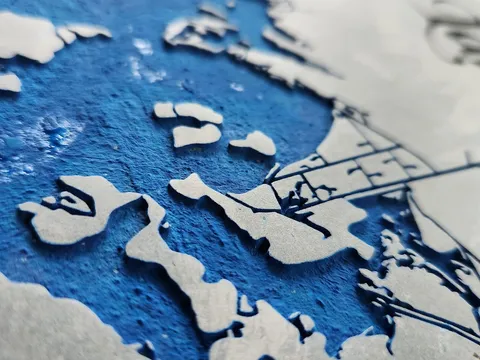 Detail shot of a hand laser-cut wood map
